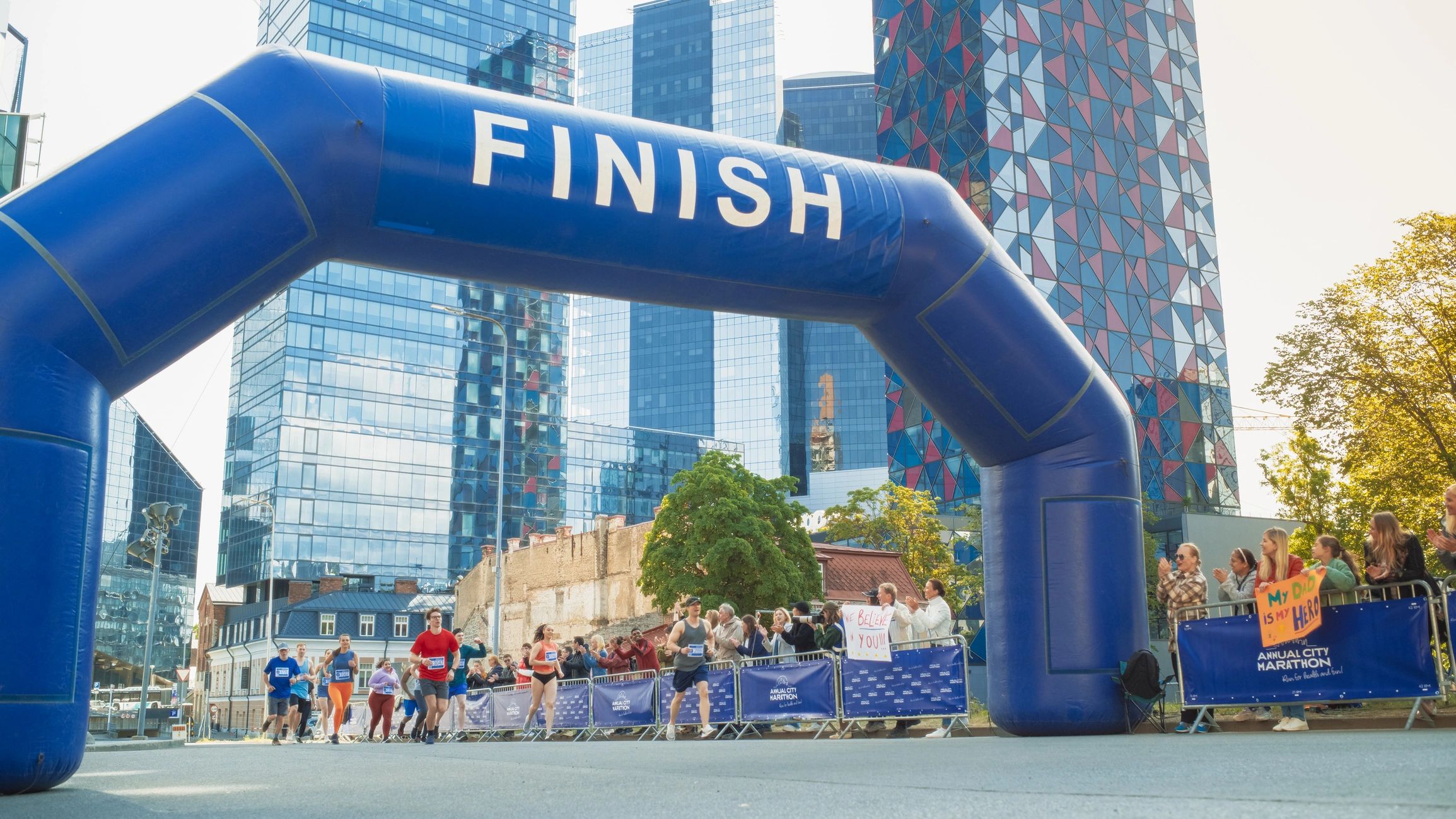 Finish-line celebration moment from a marathon event